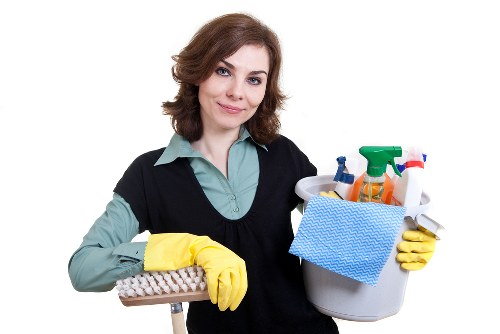 Upholstery cleaning equipment prepared for a sofa cleaning appointment in E1